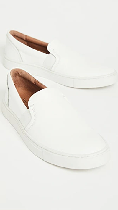 Shop Frye Ivy Slip On Sneakers In White