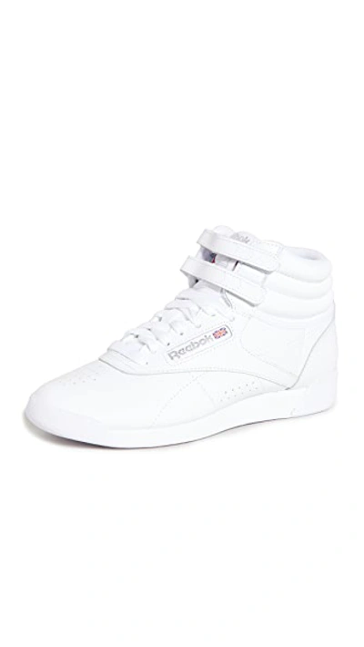 Shop Reebok Freestyle Hi Sneakers White/silver
