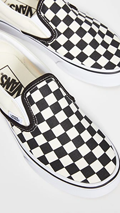 Shop Vans Ua Classic Slip-on Sneakers Black & White Checkerboard