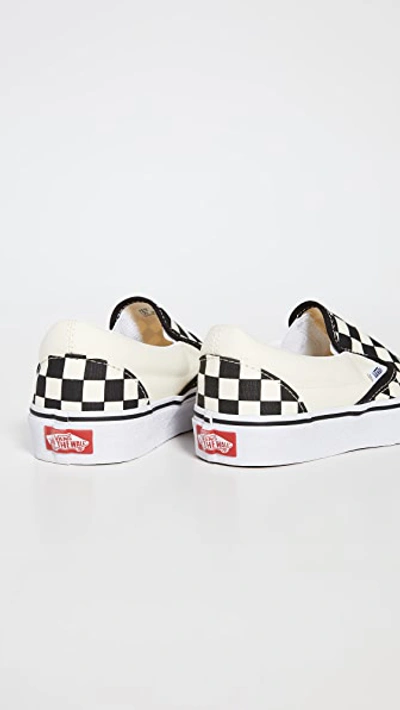 Shop Vans Ua Classic Slip-on Sneakers Black & White Checkerboard