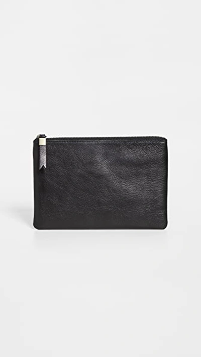 Shop Madewell The Leather Pouch Clutch In True Black