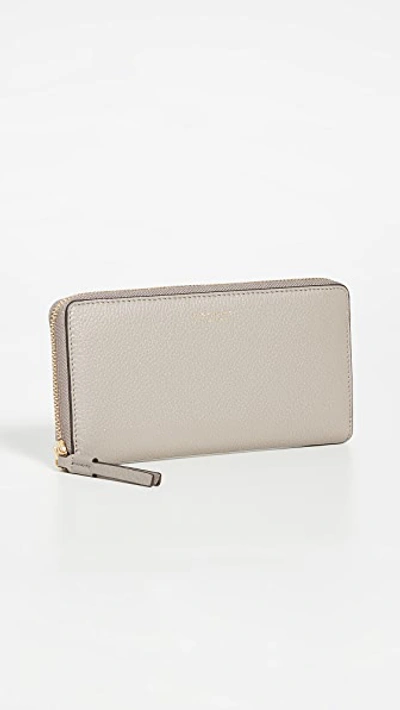 Shop Tory Burch Perry Zip Continental Wallet In Gray Heron