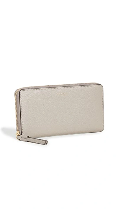 Shop Tory Burch Perry Zip Continental Wallet In Gray Heron