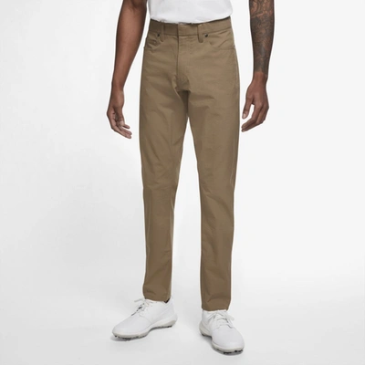 Shop Nike Men's Dri-fit Repel 5-pocket Slim Fit Golf Pants In Brown