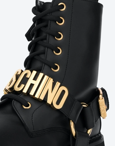 Shop Moschino Metal Lettering Calfskin Combat Boot In Black