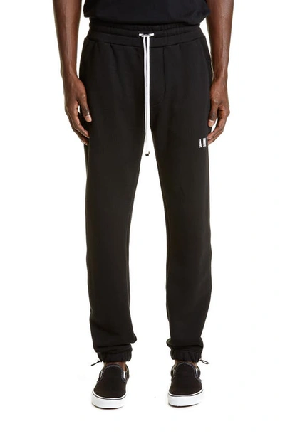 Shop Amiri Core Logo Cotton Joggers In Black