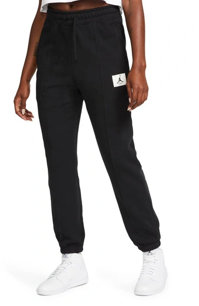 Shop Jordan Essentials Pintuck Fleece Sweatpants In Black/ Gym Red