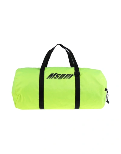 Shop Msgm Duffel Bags In Yellow