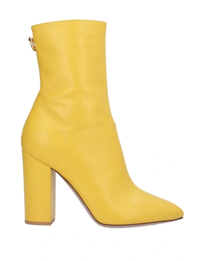 Shop Valentino Ankle Boots In Yellow