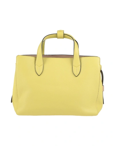Shop Liviana Conti Handbags In Yellow