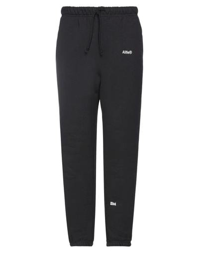 Shop Alife Pants In Black