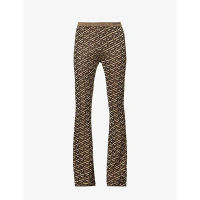Shop Versace Womens Black Gold La Greca-print Skinny High-rise Knit Trousers 10