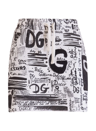 Shop Dolce & Gabbana All Over Logo-print Mini Skirt In Cipria 1
