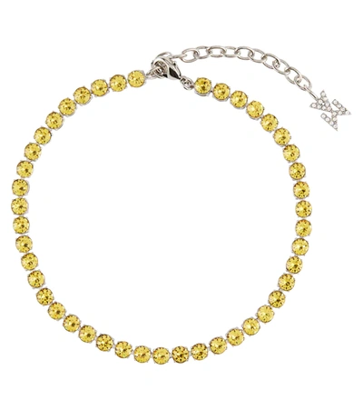 Shop Amina Muaddi Tennis Crystal-embellished Anklet In Yellow