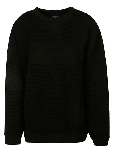 Shop Balmain Embossed Logo Ribbed Sweater In Black