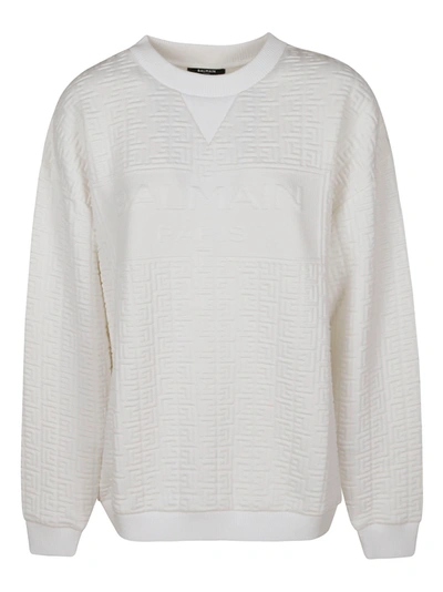 Shop Balmain Embossed Logo Ribbed Sweater In White