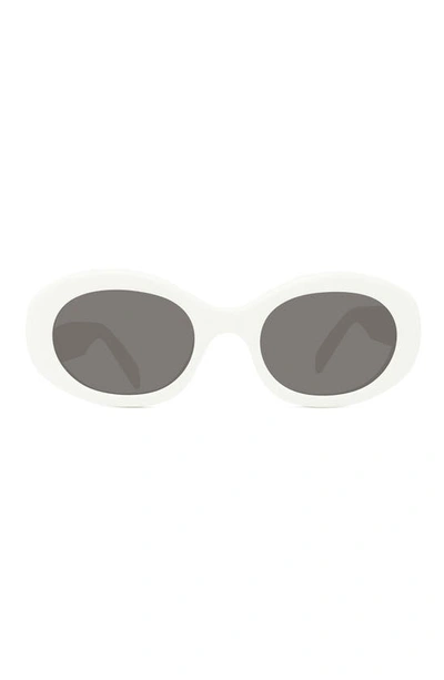 Shop Celine Triomphe 52mm Oval Sunglasses In Shiny Solid Ivory/ Smoke