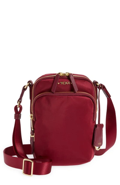 Shop Tumi Voyageur Ruma Nylon Crossbody Bag In Berry/ Gold