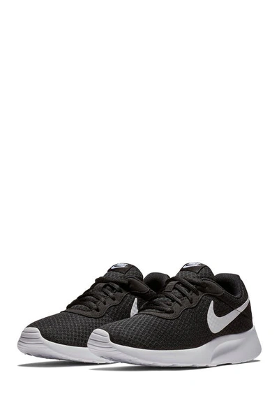 Shop Nike Tanjun Sneaker In 011 Black-white