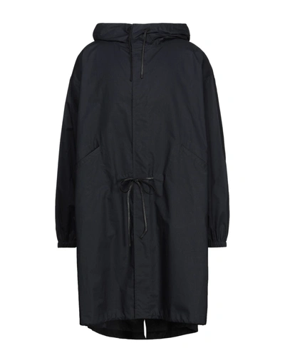 Jil Sander Overcoats In Blue