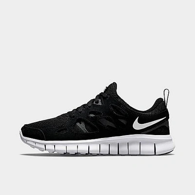 Shop Nike Big Kids' Free Run 2 Running Shoes In Black/white/dark Grey