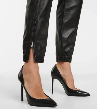 Shop Saint Laurent Zip-cuff Leather Sweatpants In Black