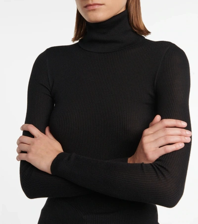 Shop Saint Laurent Cashmere, Wool And Silk Turtleneck Sweater In Black