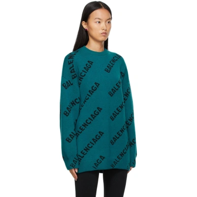 Shop Balenciaga All Over Logo Sweater In Petrol Blue