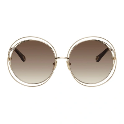 Shop Chloé Gold Carlina Round Sunglasses