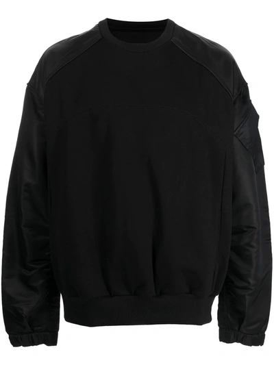 Shop Juunj Contrasting-sleeves Cotton Jumper In 黑色