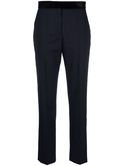 Shop Sandro Pressed-crease Tailored Trousers In 蓝色