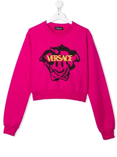 Shop Versace Smiley Medusa Logo Sweatshirt In 粉色
