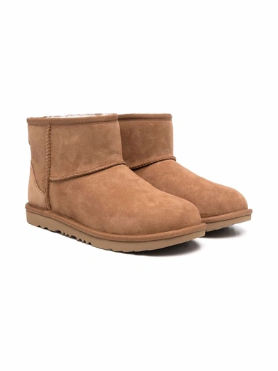 Shop Ugg Teen Classic Mini Ii Shearling Ankle Boots In 褐色