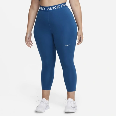 Shop Nike Pro Women's Mid-rise Crop Leggings In Court Blue,white