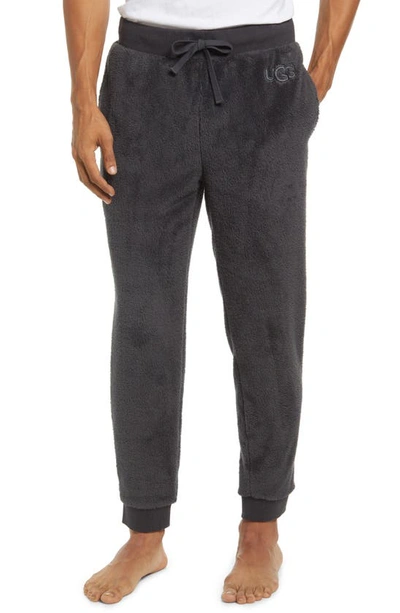 Shop Ugg Lionel Fleece Jogger Pajama Pants In Ink Black