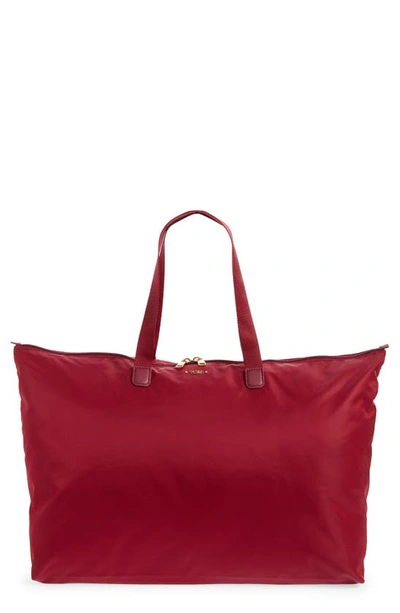 Shop Tumi Voyageur Just In Case Packable Nylon Tote In Berry/ Gold