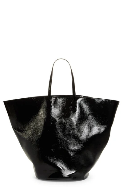 Shop Khaite The Large Osa Crinkle Patent Leather Tote In Black