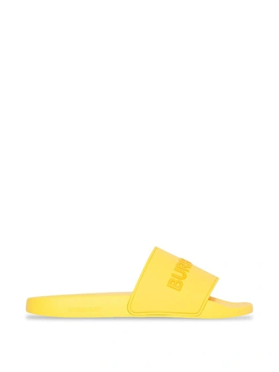 Shop Burberry Furley Solid Slide Yellow