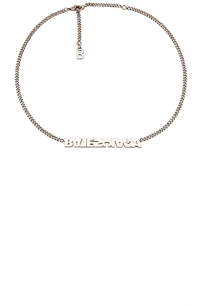 Shop Balenciaga Typo Turn Necklace In Antique Silver