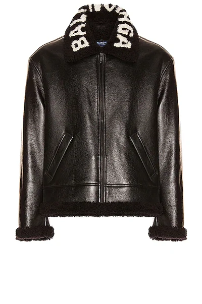 Shop Balenciaga Cocoon Shearling Jacket In Black