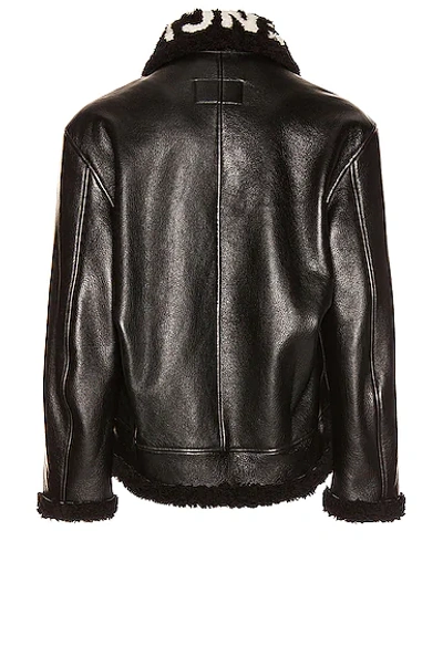 Shop Balenciaga Cocoon Shearling Jacket In Black