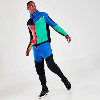 Shop Nike Tech Fleece Taped Jogger Pants In Deep Royal Blue/black