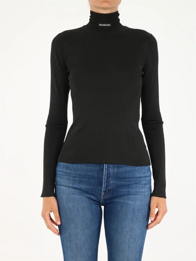 Shop Balenciaga Stretch Turtleneck Sweater In Black