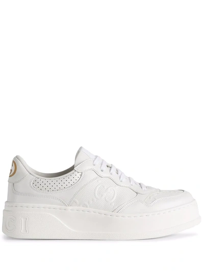 Shop Gucci Gg-embossed Leather Sneakers In Weiss