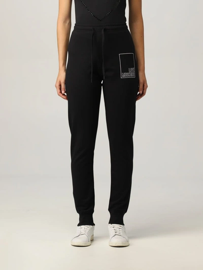 Shop Love Moschino Jogging Pants With Stitched Logo In Black