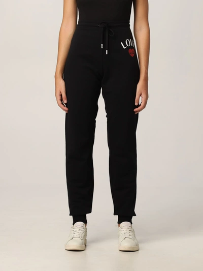 Shop Love Moschino Jogging Pants With Logo In Black