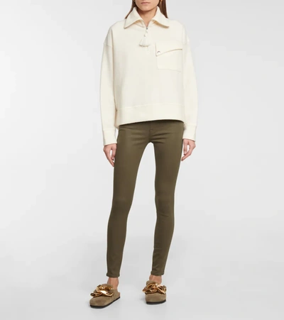 Shop Frame Le Skinny De Jeanne Mid-rise Jeans In Green