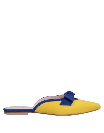 Shop Anna Baiguera Mules & Clogs In Yellow