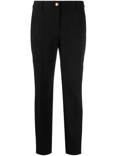 Shop Boutique Moschino Mid-rise Slim-fit Trousers In Schwarz