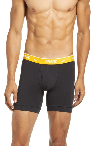 Shop Nike Dri-fit Everyday Assorted 3-pack Performance Boxer Briefs In Black/ Gold / Hyper Royal